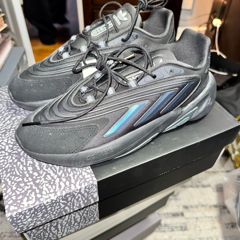 adidas Men’s Black Sneakers with Iridescent Blue Accent